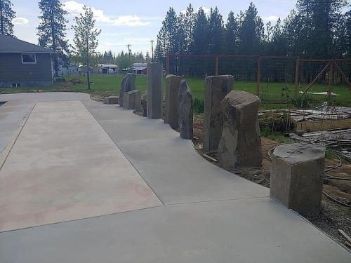 Boulder retaining wall and hardscaping in Spokane