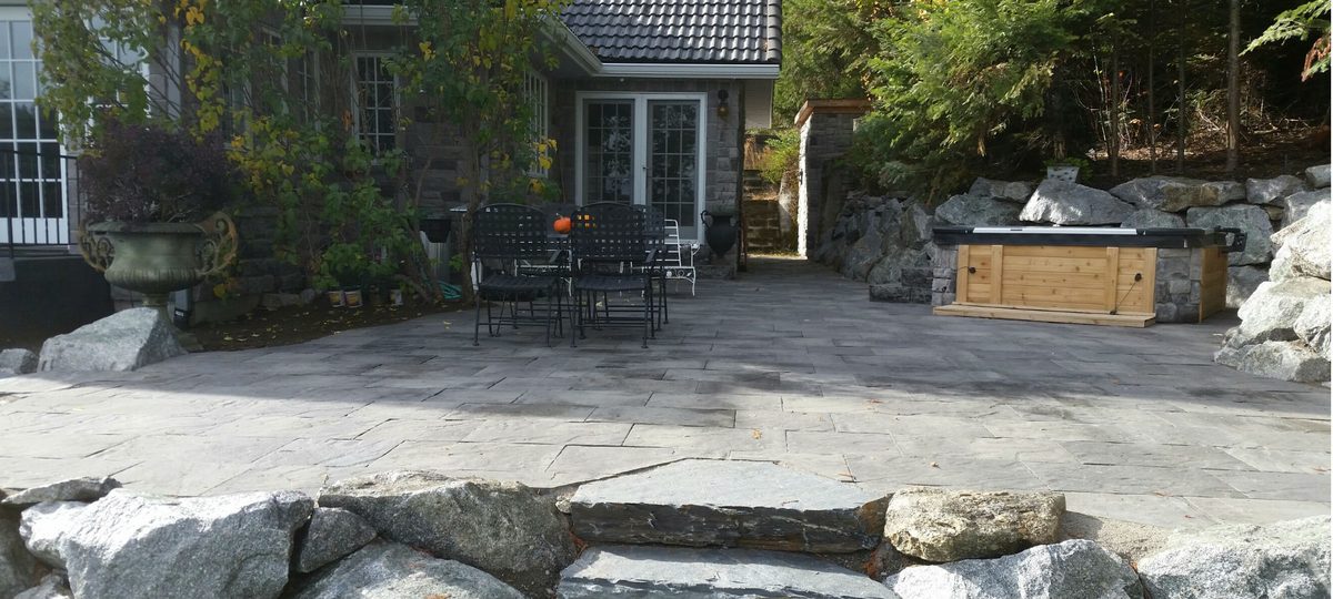 Custom paver backyard patio built in Spokane