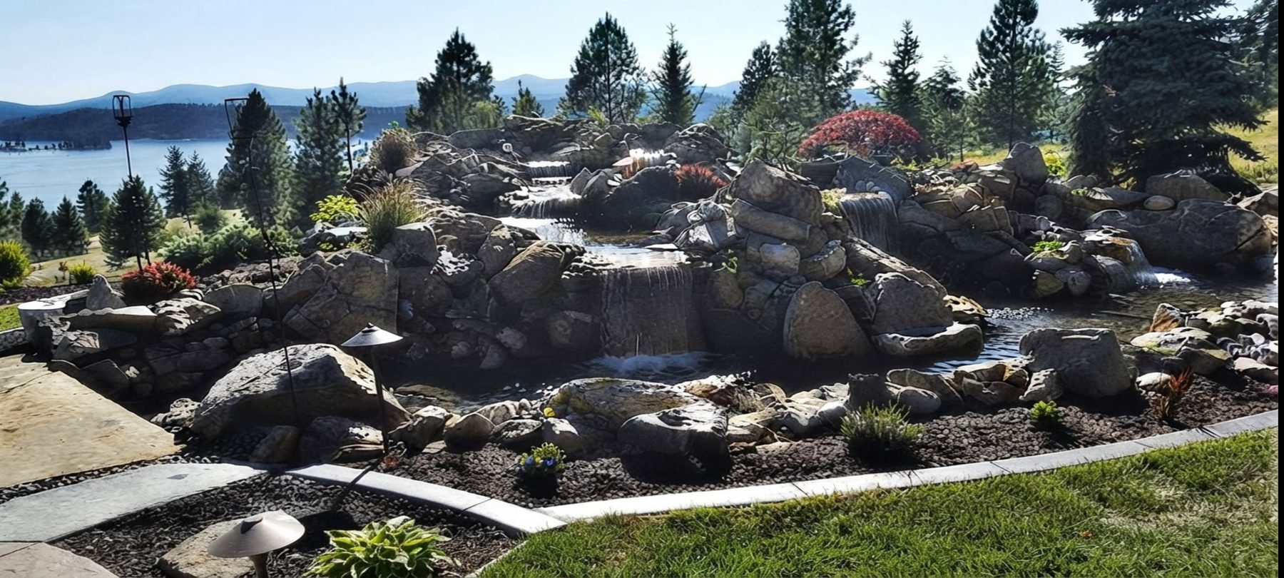 Natural stone water feature by Custom Creations Landscape near Nine Mile Falls